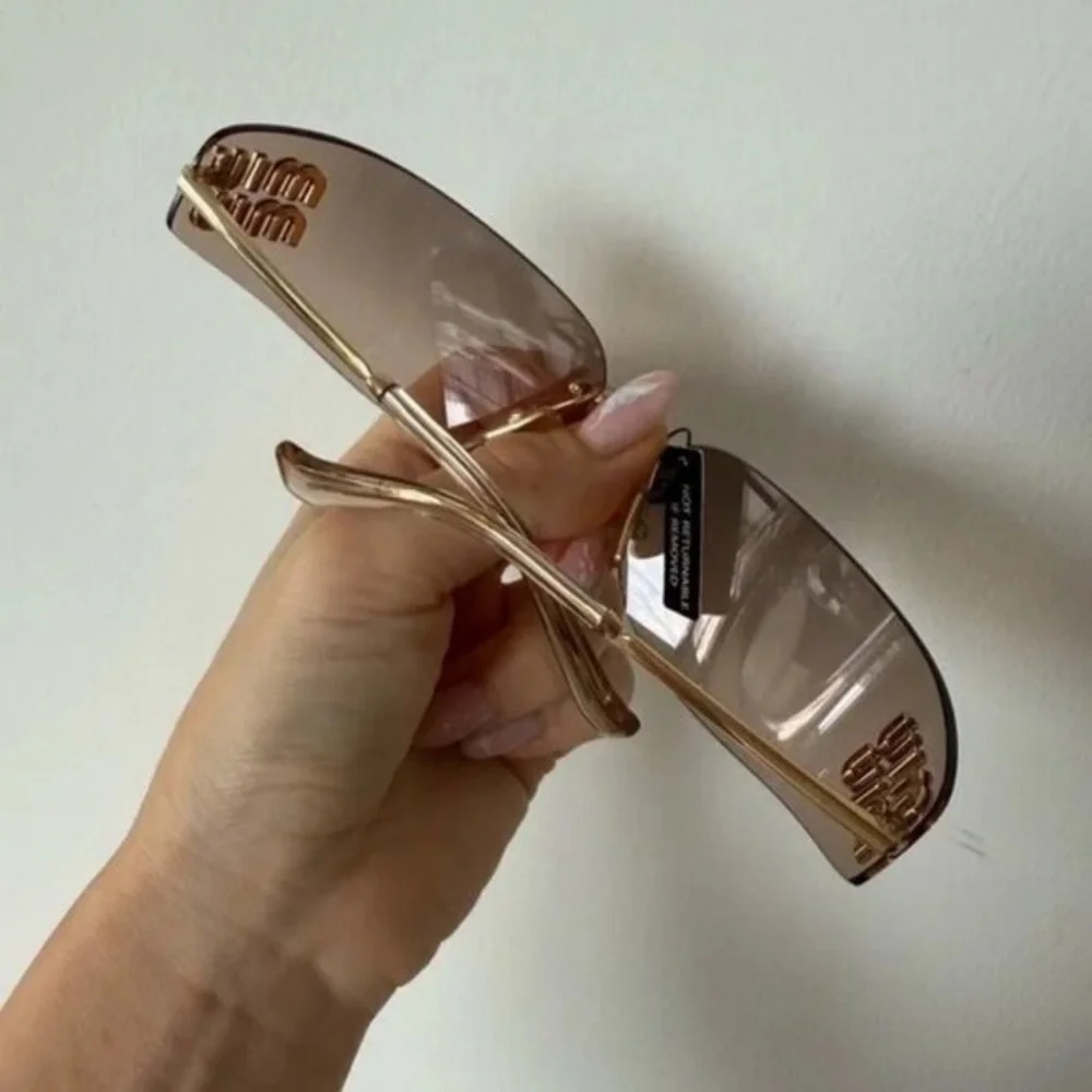 Miu Miu Rimless Pink Gradient Sunglasses with Gold Hardware